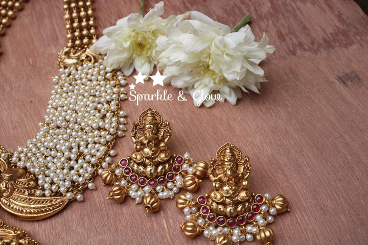 Gold alike polished Ganesha carved pearl cluster statement haram - Sparkle and Glow