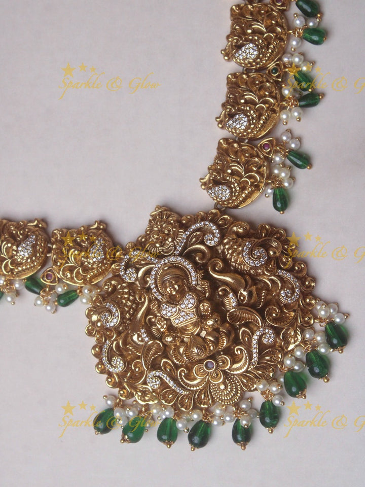 Gold alike Elegant Lakshmi Peacock necklace with green beads