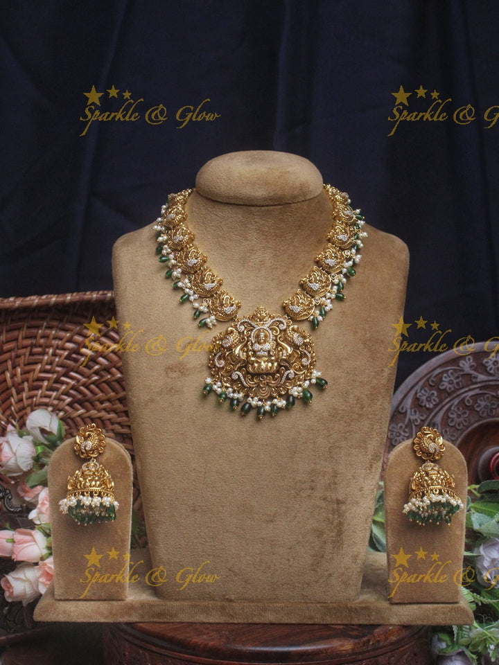 Gold alike Elegant Lakshmi Peacock necklace with green beads