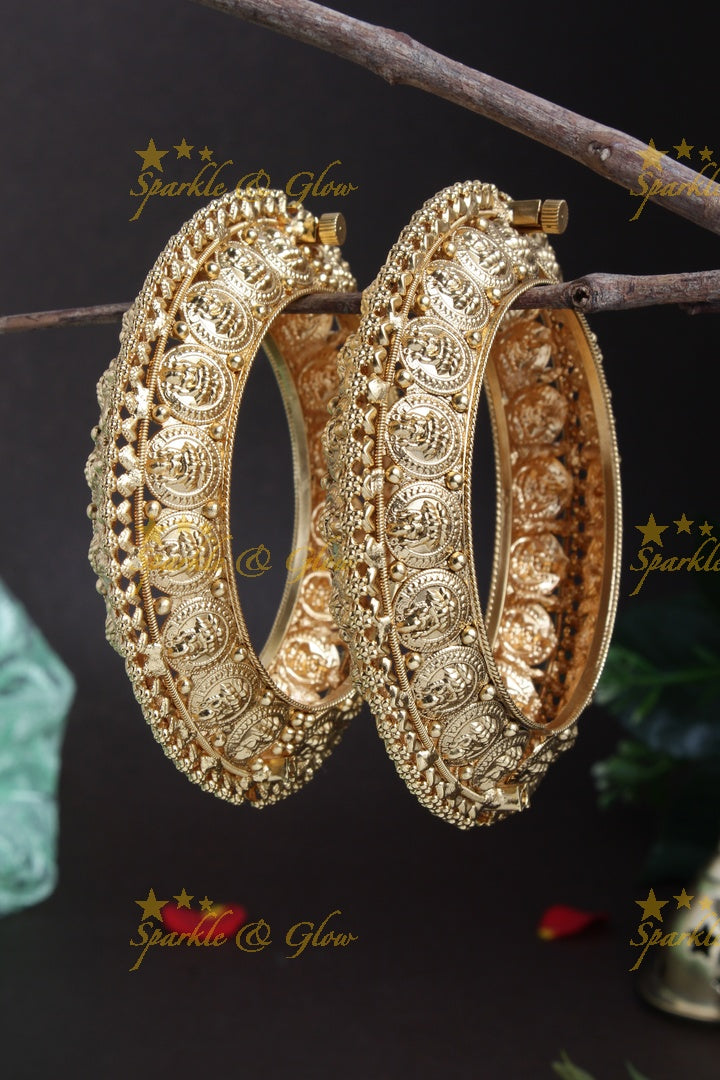 Intricately carved Lakhsmi coin type bangles