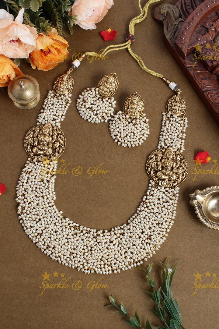 Gold alike pearl cluster statement lakshmi carved necklace