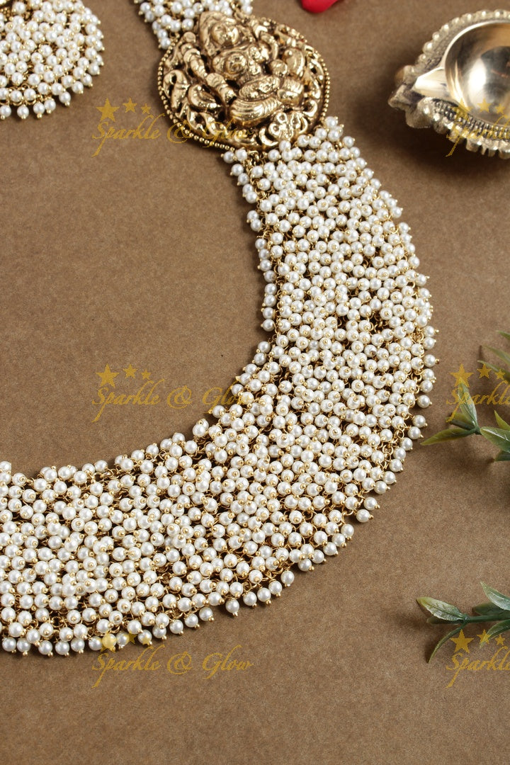 Gold alike pearl cluster statement lakshmi carved necklace