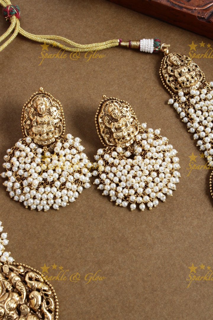 Gold alike pearl cluster statement lakshmi carved necklace