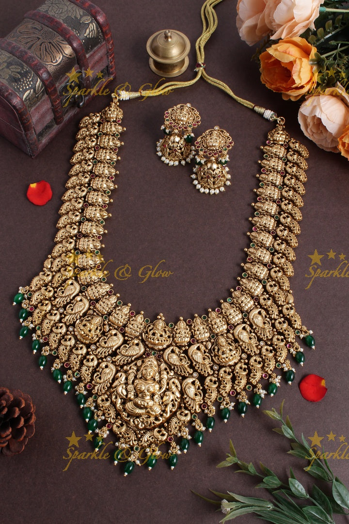 Exclusive bridal lakshmi carved necklace with green beads