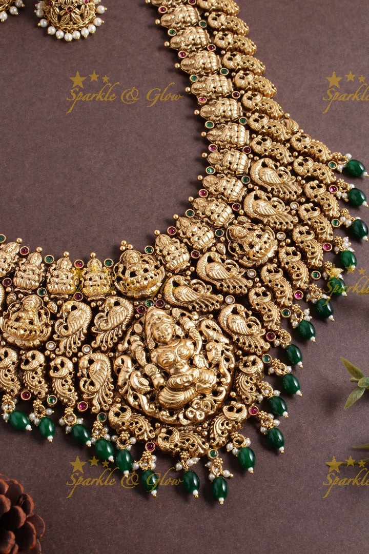 Exclusive bridal lakshmi carved necklace with green beads