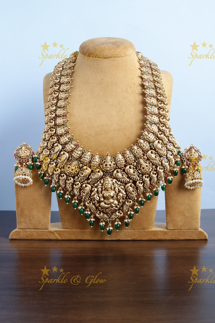 Exclusive bridal lakshmi carved necklace with green beads