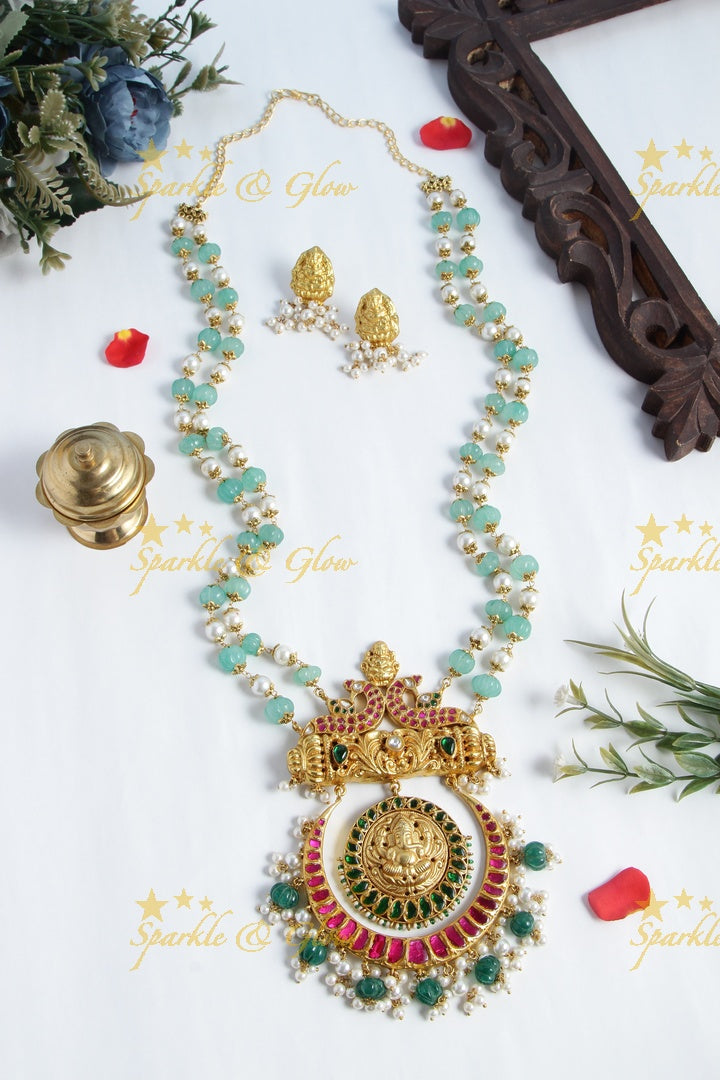 Gold alike pumpkin and pearl necklace with jadau ganesh carved half moon pendent - Sparkle and Glow