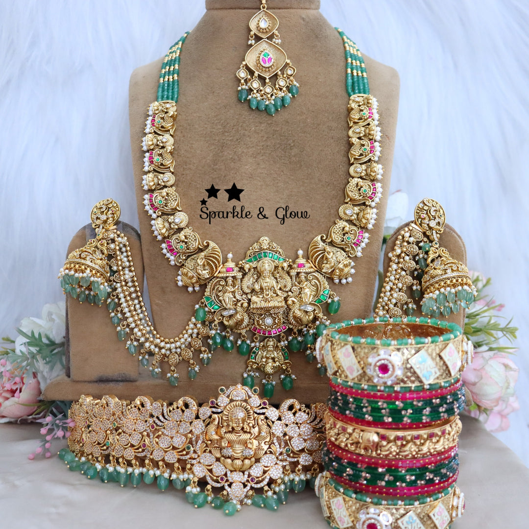Enhance your bridal look with this beautifully crafted Temple Semi Bridal Set, inspired by traditional South Indian artistry!!
Wedding Season Sale Get 15% discount on sitewide
Get Free Gift Above 10k
Get Free Shipping above 7.5k &30k(Domestic&
International)
Get 7% discount on First Order

1.ID L-6641,H-25253,EC-23478,B-24580,24718,25821_2_4,MT-24491
2.ID L-9206,H-18186,EC-28332,B-24580,24587,25821_2_4,MT-25121
3.ID L-19955,H-18186,EC-23471,B-2945,17419,MT-29027
4.ID L-18097,H-18186,E-17099,EC-27951,B-2945,