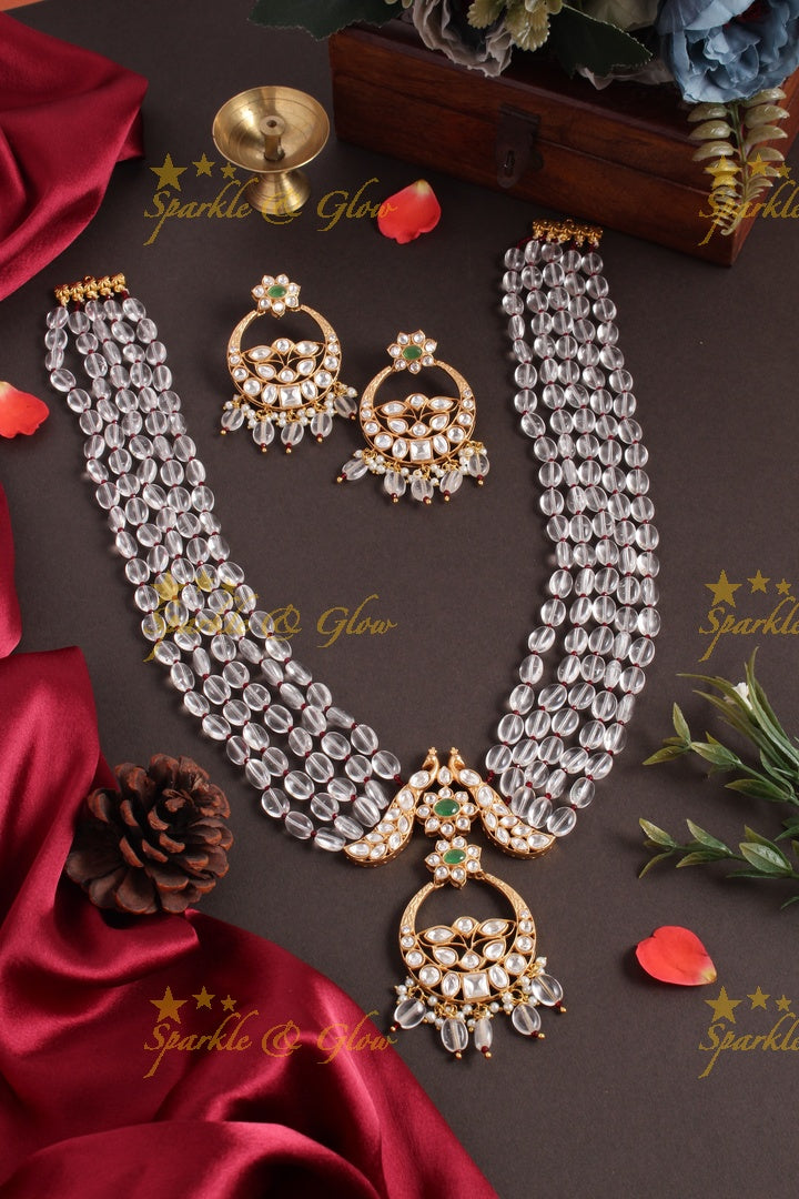 Beautiful kundan peacock necklace with half moon floral pendent - Red
