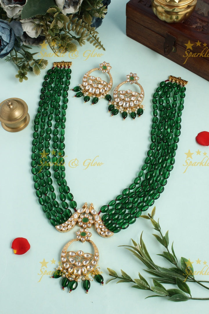 Beautiful kundan peacock necklace with half moon floral pendent - Red