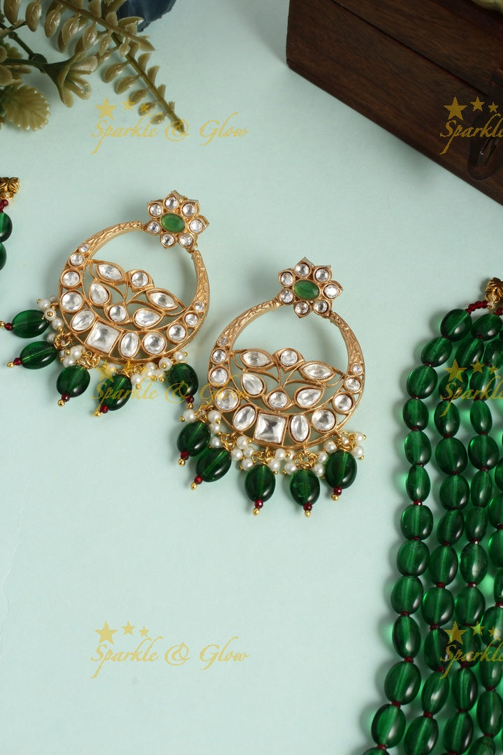 Beautiful kundan peacock necklace with half moon floral pendent - Green