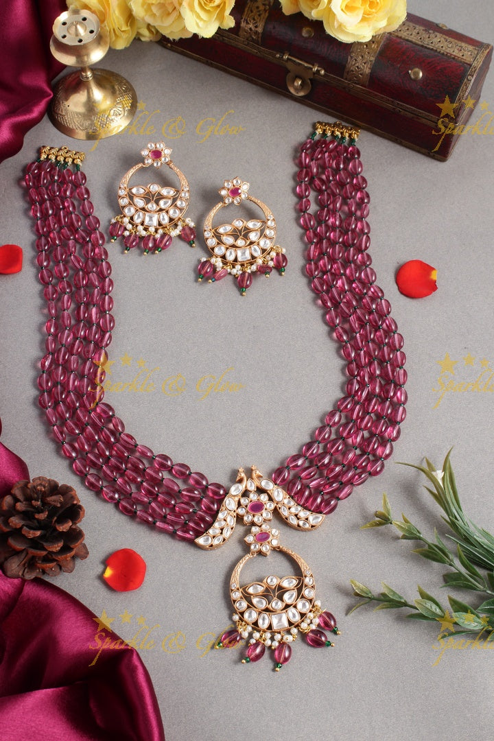 Beautiful kundan peacock necklace with half moon floral pendent - Red