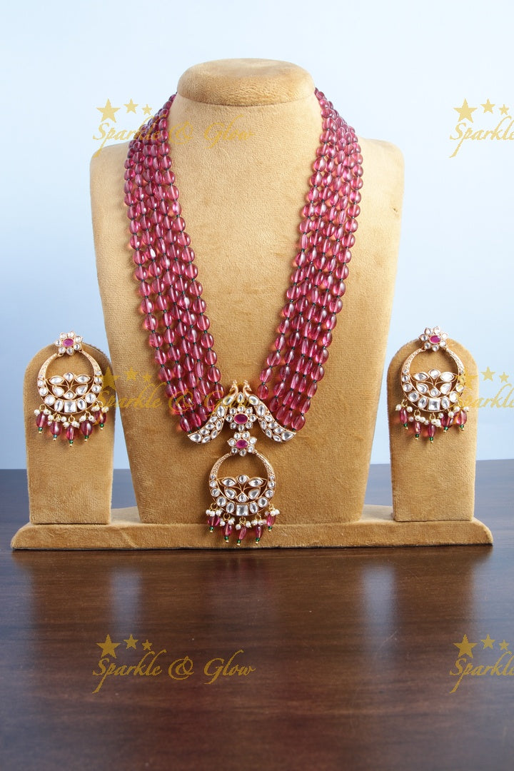 Beautiful kundan peacock necklace with half moon floral pendent - Red