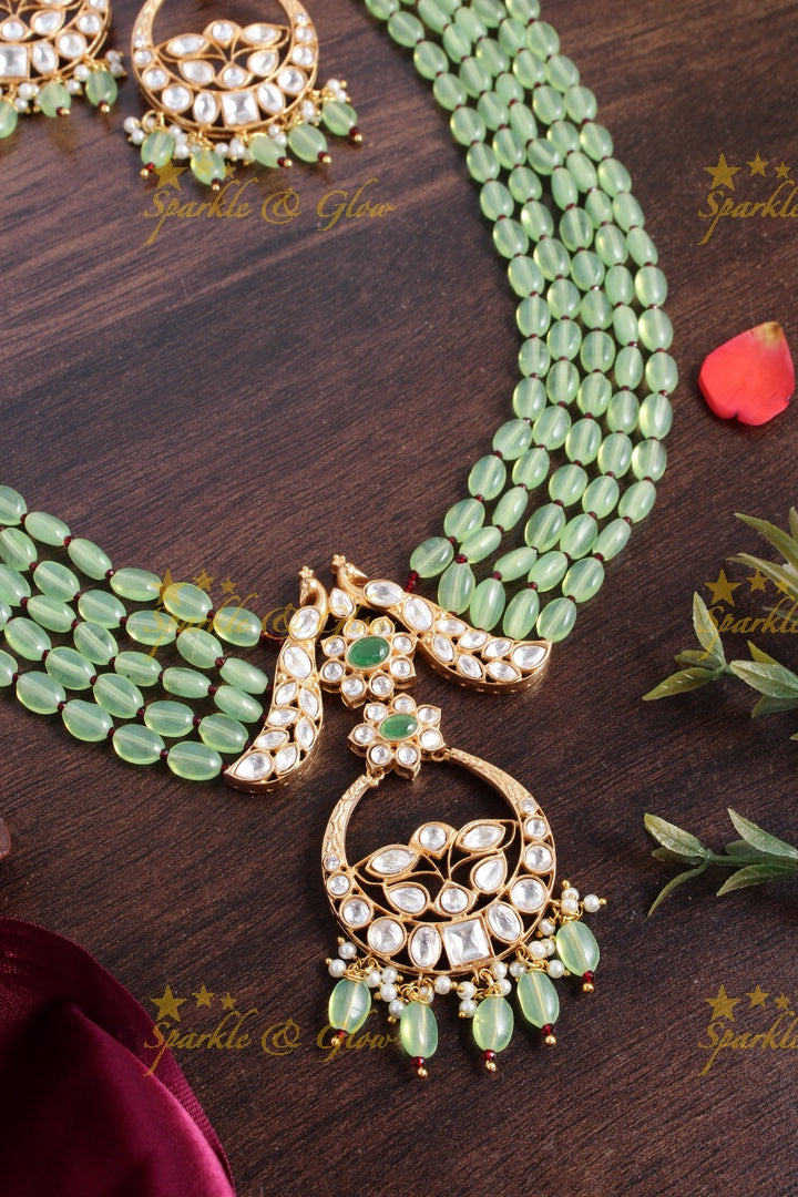 Beautiful kundan peacock necklace with half moon floral pendent - Mint Green