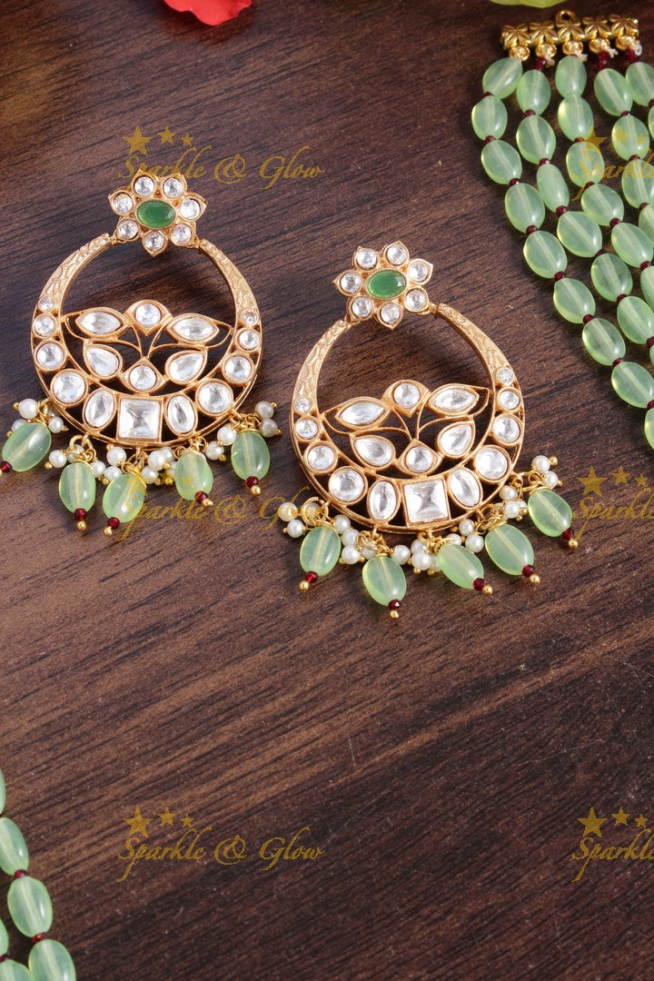Beautiful kundan peacock necklace with half moon floral pendent - Mint Green