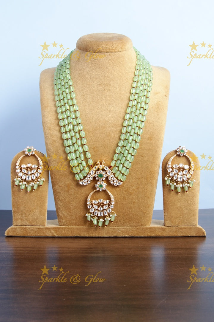 Beautiful kundan peacock necklace with half moon floral pendent - Mint Green