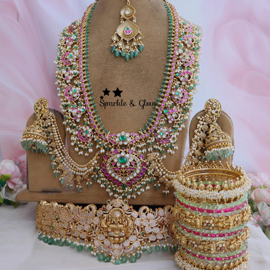 Enhance your bridal look with this beautifully crafted Temple Semi Bridal Set, inspired by traditional South Indian artistry!!
Wedding Season Sale Get 15% discount on sitewide
Get Free Gift Above 10k
Get Free Shipping above 7.5k &30k(Domestic&
International)
Get 7% discount on First Order

1.ID L-6641,H-25253,EC-23478,B-24580,24718,25821_2_4,MT-24491
2.ID L-9206,H-18186,EC-28332,B-24580,24587,25821_2_4,MT-25121
3.ID L-19955,H-18186,EC-23471,B-2945,17419,MT-29027
4.ID L-18097,H-18186,E-17099,EC-27951,B-2945,