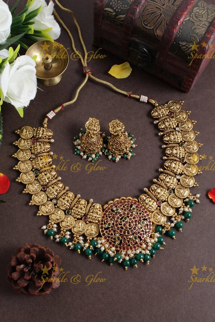 Intricately carved lakshmi carved lakshmi coin peacock pendent gold beads necklace - Sparkle and Glow