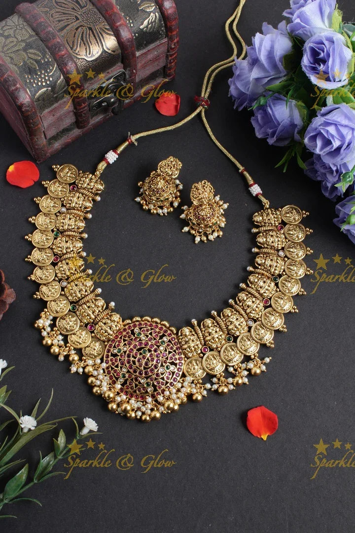 Intricately carved lakshmi carved lakshmi coin peacock pendent gold beads necklace - Sparkle and Glow