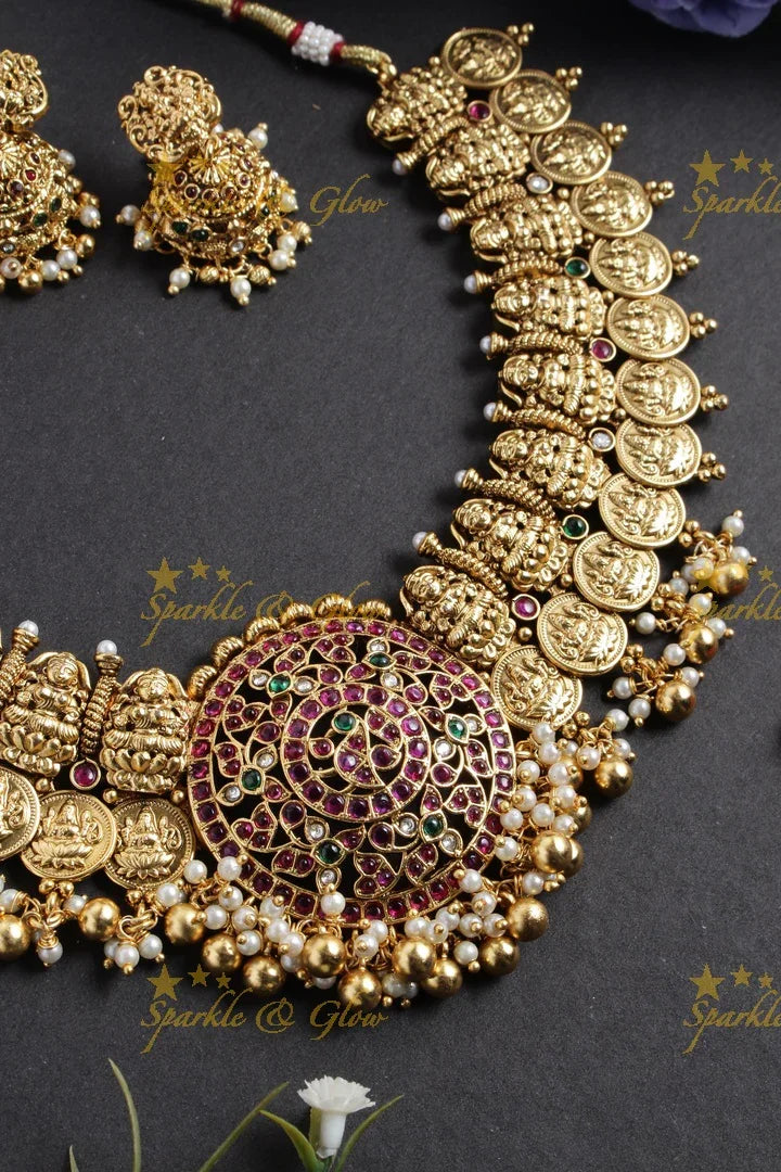 Intricately carved lakshmi carved lakshmi coin peacock pendent gold beads necklace - Sparkle and Glow