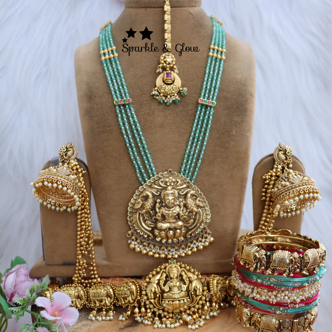 Handcrafted Temple Beaded Semi Bridal Set ✨👑💖
Embrace timeless elegance with this Royal Temple Beaded Semi Bridal Set!!
Wedding Season Sale Get 15% discount on sitewide
Get Free Gift Above 10k
Get Free Shipping above 7.5k &30k(Domestic&
International)
Get 7% discount on First Order

1.ID L-17282,H-18186,E-14539,EC-28332,MT-25108,B-2975,1660,18504_2_4
2.ID L-13454,H-3479,E-14538,EC-23479,MT-29352,B-2945,24595,15215_2_4
3.ID L-22660,H-18186,E-2769,EC-18099,MT-24489,B-17414,1660,18504_2_4
4.ID L-19945,H-2960