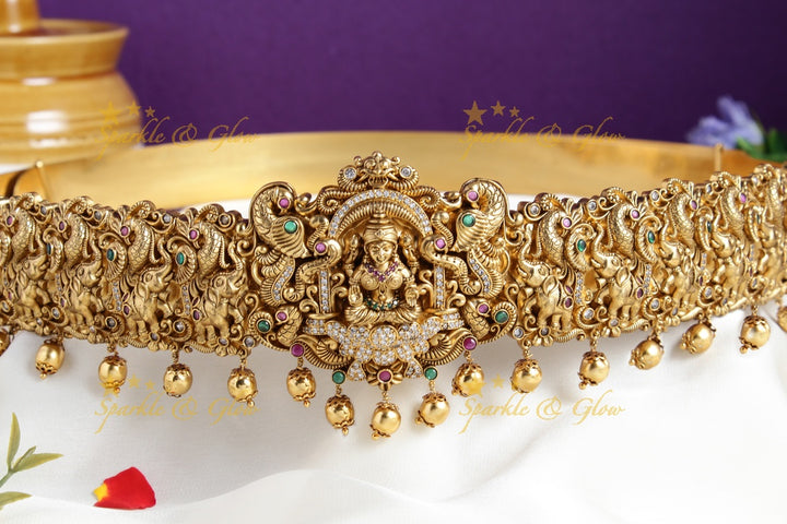 Gold alike intricately carved Elephant peacock carved Lakshmi hipbelt with gold beads