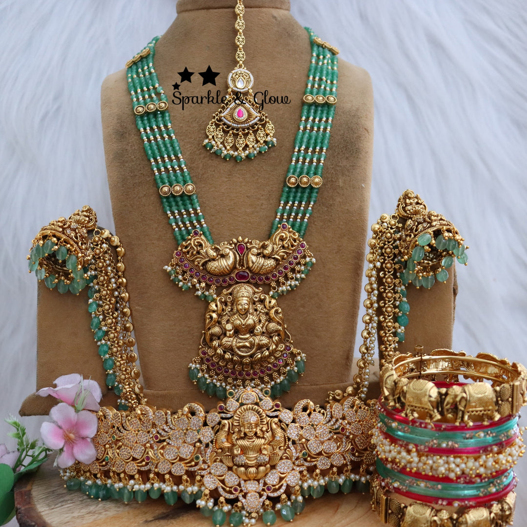Handcrafted Temple Beaded Semi Bridal Set ✨👑💖
Embrace timeless elegance with this Royal Temple Beaded Semi Bridal Set!!
Wedding Season Sale Get 15% discount on sitewide
Get Free Gift Above 10k
Get Free Shipping above 7.5k &30k(Domestic&
International)
Get 7% discount on First Order

1.ID L-17282,H-18186,E-14539,EC-28332,MT-25108,B-2975,1660,18504_2_4
2.ID L-13454,H-3479,E-14538,EC-23479,MT-29352,B-2945,24595,15215_2_4
3.ID L-22660,H-18186,E-2769,EC-18099,MT-24489,B-17414,1660,18504_2_4
4.ID L-19945,H-2960