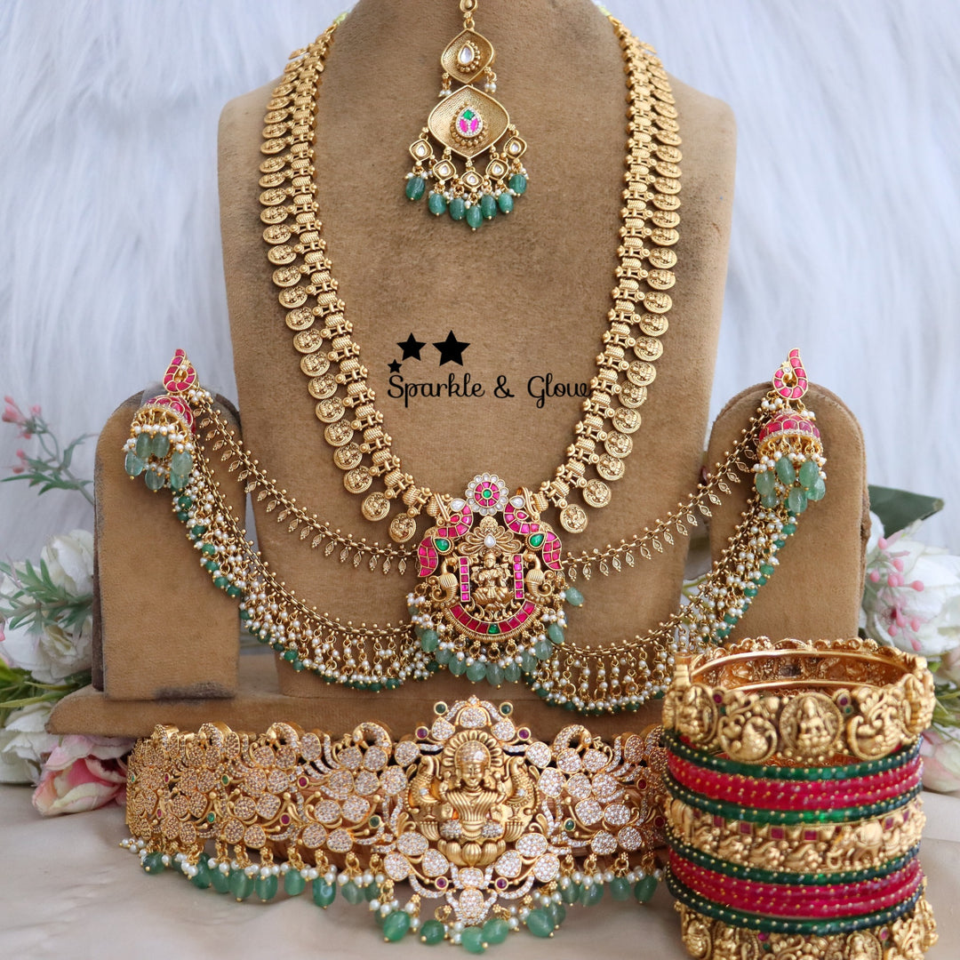 Enhance your bridal look with this beautifully crafted Temple Semi Bridal Set, inspired by traditional South Indian artistry!!
Wedding Season Sale Get 15% discount on sitewide
Get Free Gift Above 10k
Get Free Shipping above 7.5k &30k(Domestic&
International)
Get 7% discount on First Order

1.ID L-6641,H-25253,EC-23478,B-24580,24718,25821_2_4,MT-24491
2.ID L-9206,H-18186,EC-28332,B-24580,24587,25821_2_4,MT-25121
3.ID L-19955,H-18186,EC-23471,B-2945,17419,MT-29027
4.ID L-18097,H-18186,E-17099,EC-27951,B-2945,