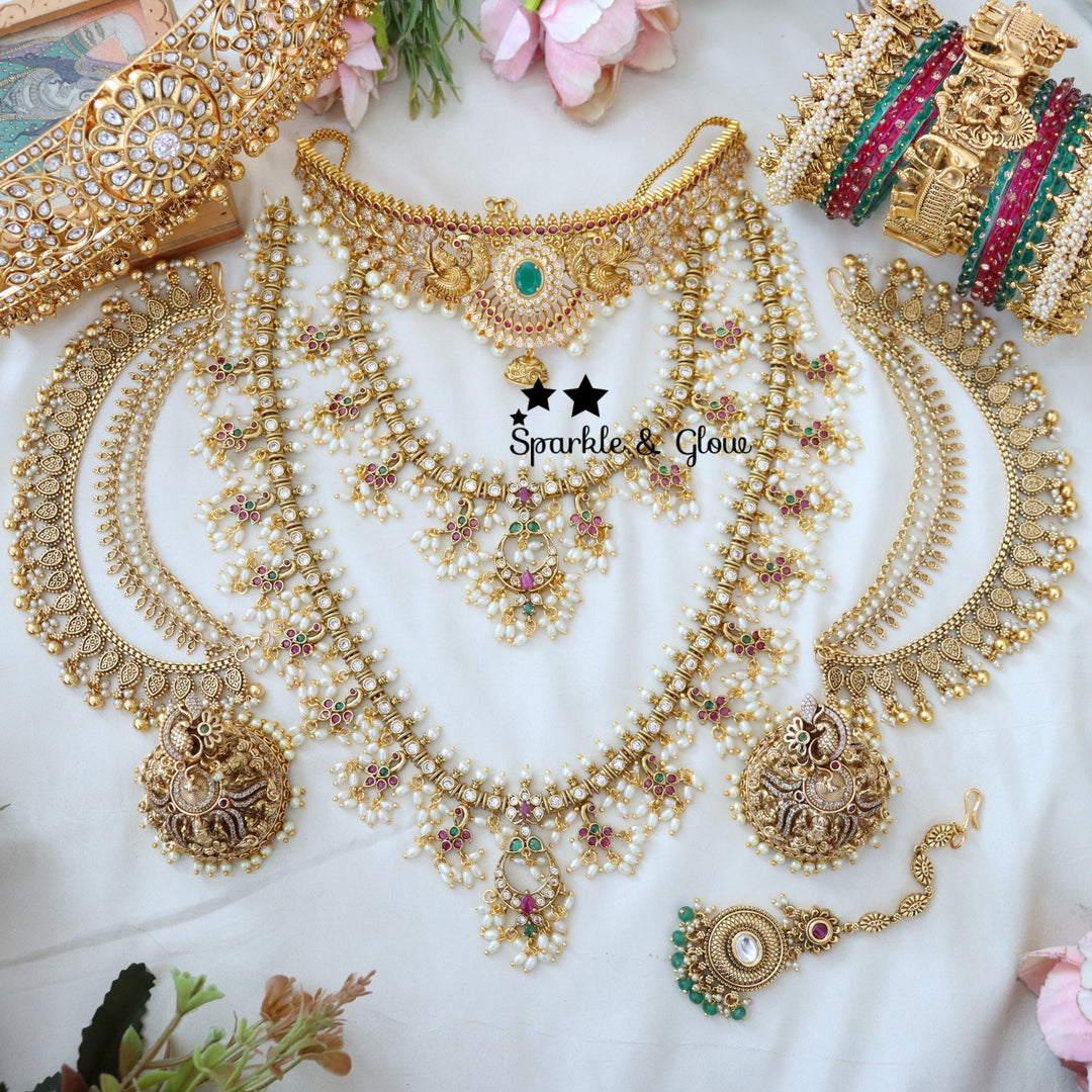Regal Guttapusalu Bridal Set – A Timeless Symbol of South Indian Bridal Elegance !!
Wedding Season Sale Get 15% discount on sitewide
Get Free Gift Above 10k
Get Free Shipping above 7.5k &30k(Domestic&
International)
Get 7% discount on First Order

1.ID L-7133,S-6895,C-3059,H-28869,E-17101,EC-27981
2.ID L-27554,S-27553,C-17253,H-18117,E-23443,EC-19434
3.ID L-27539,S-27540,C-17253,E-18719,H-7133,EC-27882
4.ID L-27542,S-27541,C-23414,H-7133,E-17099,EC-19434
5.ID 30334
6.ID 30337
7.ID L-17733,S-17937,C-4174,H-1