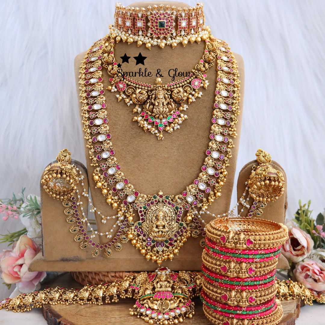 ✨ Grand Temple Bridal Set – Timeless Heritage for the Modern Bride ✨
Adorn yourself with the elegance of tradition with this exquisite Temple Bridal Set!!
Wedding Season Sale Get 15% discount on sitewide
Get Free Gift Above 10k
Get Free Shipping above 7.5k &30k(Domestic&
International)
Get 7% discount on First Order

1.ID L-27183,S-27182,C-28587,H-29587,E-28103,EC-15454
2.ID L-6736,S-1409,C-23414,H-24622,E-6331,EC-12949
3.ID L-12321,S-8390,C-17253,H-18111,E-12803,EC-12538
4.ID L-9959,S-19995,C-28901,H-26115