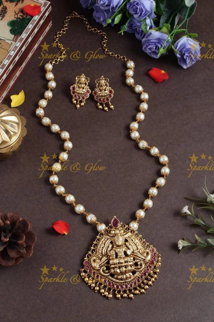 Pearl necklace with lakshmi carved pendent - Sparkle and Glow