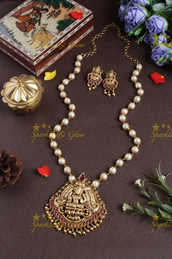 Pearl necklace with lakshmi carved pendent - Sparkle and Glow