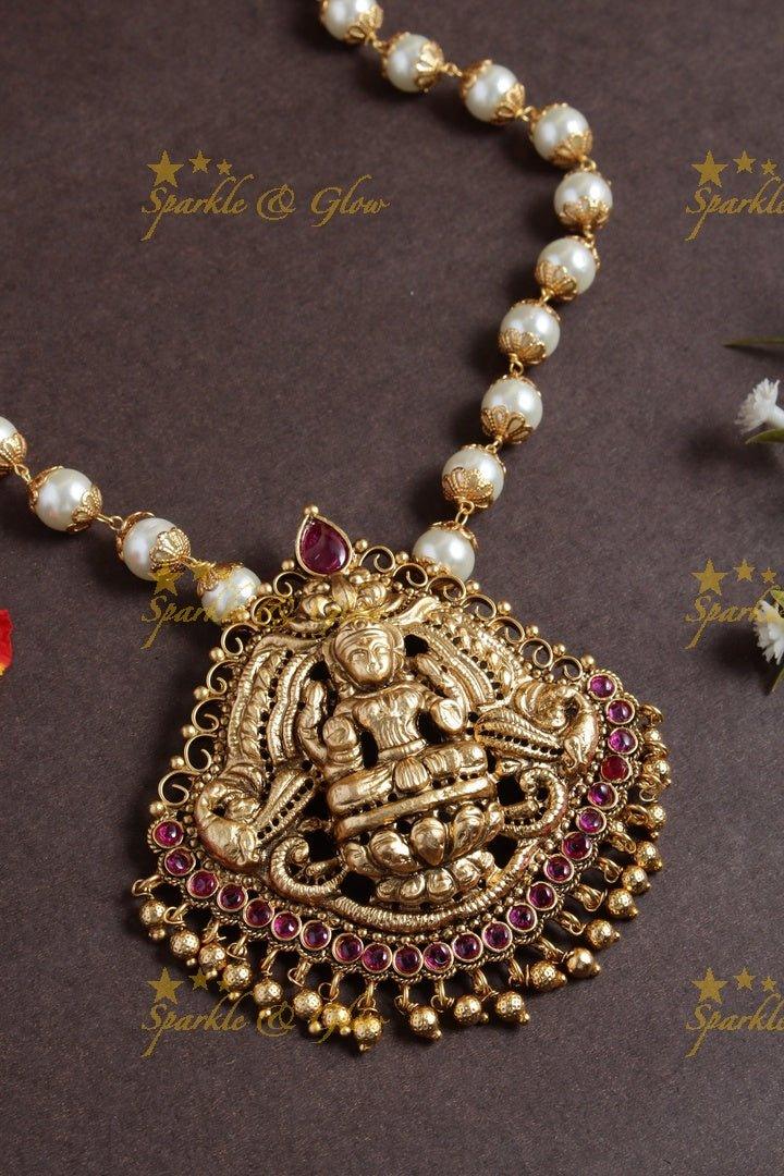 Pearl necklace with lakshmi carved pendent - Sparkle and Glow