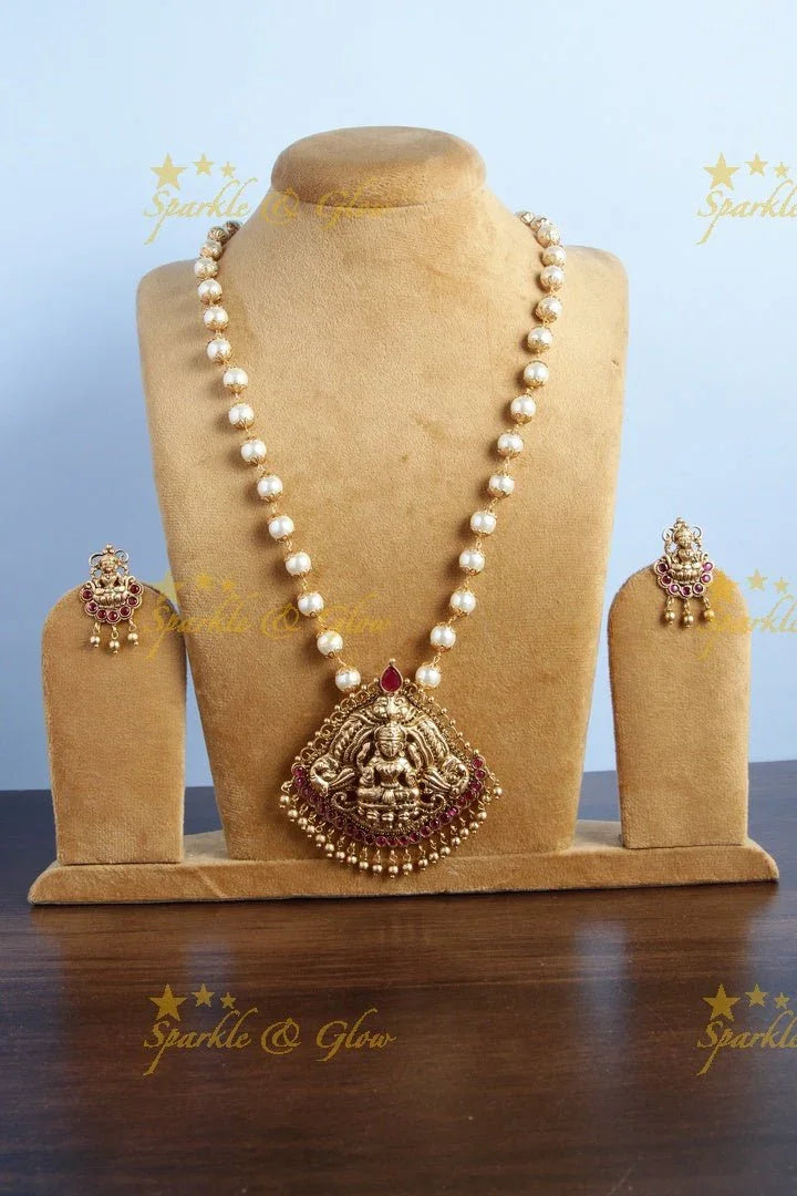 Pearl necklace with lakshmi carved pendent - Sparkle and Glow