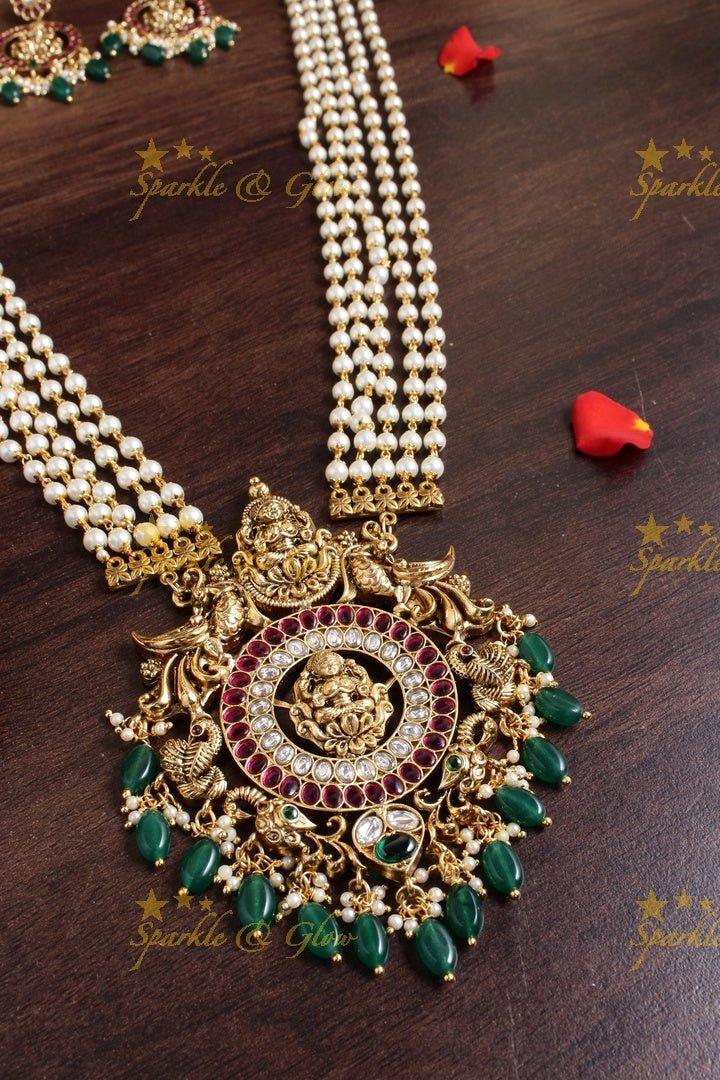 Beautiful multilayered pearl necklace with Lakshmi peacock carved pendent - Sparkle and Glow