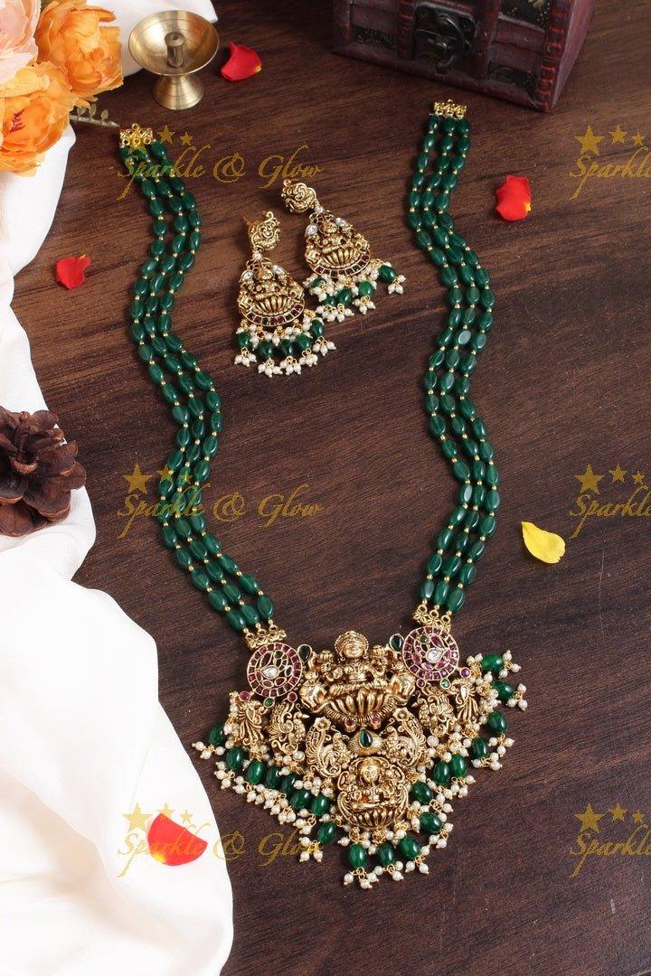 Exclusive long green beads necklace with intricately carved lakhsmi pendent - Sparkle and Glow