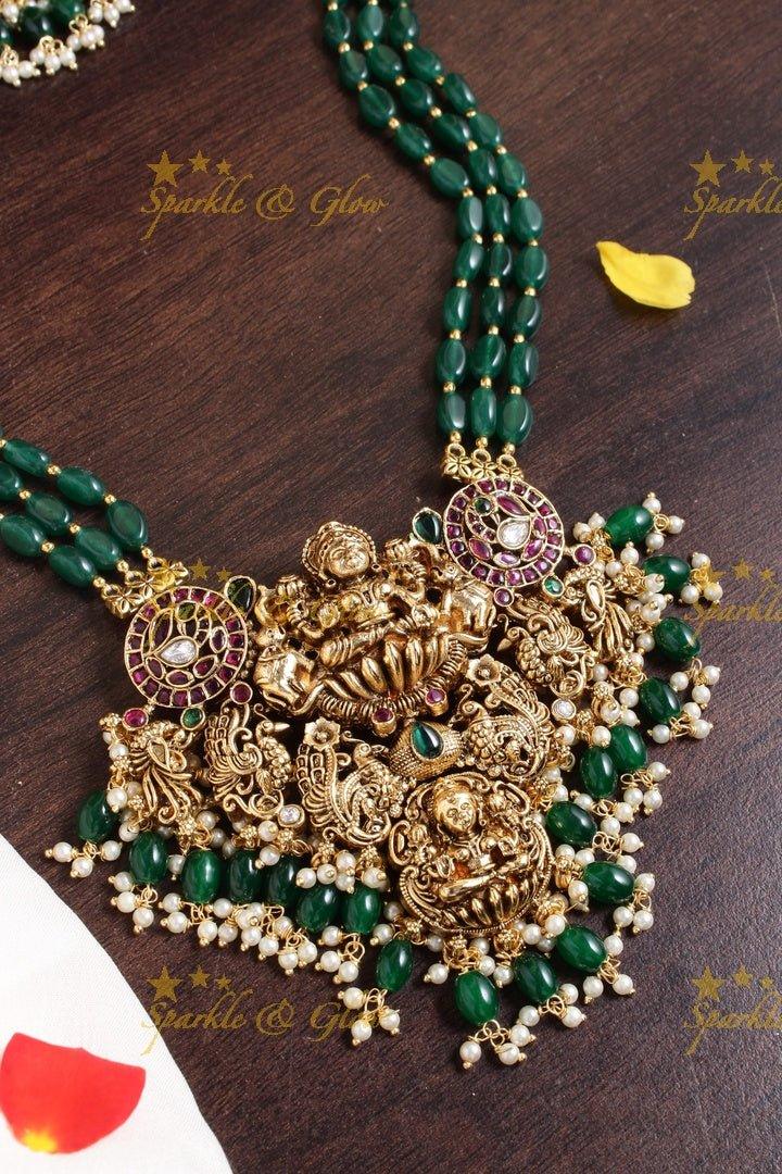 Exclusive long green beads necklace with intricately carved lakhsmi pendent - Sparkle and Glow