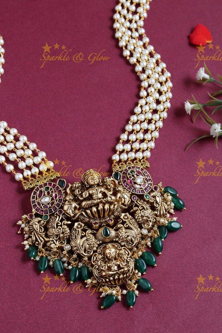Exclusive long pearl necklace with intricately carved Lakshmi pendent - Sparkle and Glow