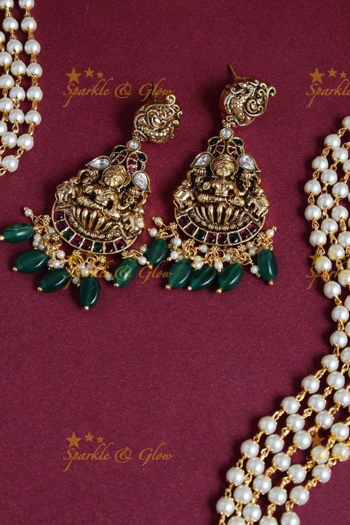 Exclusive long pearl necklace with intricately carved Lakshmi pendent - Sparkle and Glow