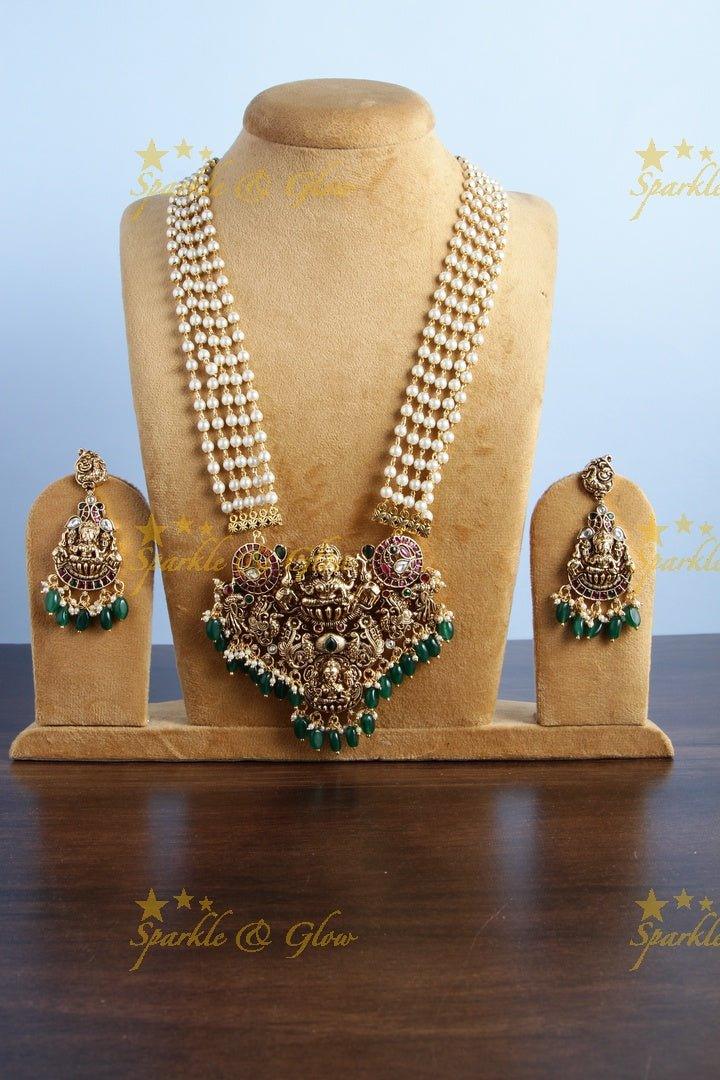 Exclusive long pearl necklace with intricately carved Lakshmi pendent - Sparkle and Glow