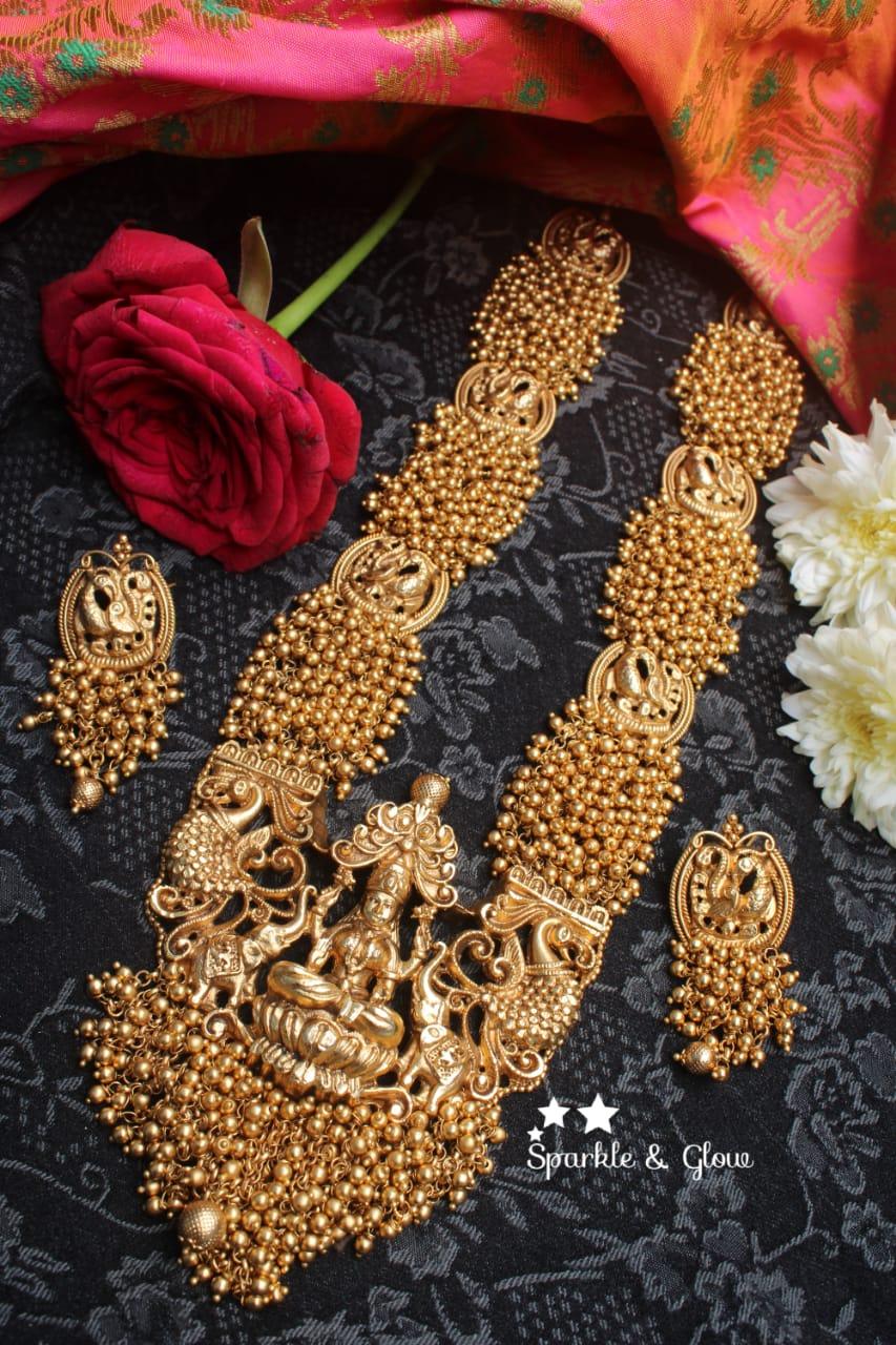 Gold alike polished Lakshmi mid length haram with gold beads cluster statement haram - Gold - Sparkle and Glow