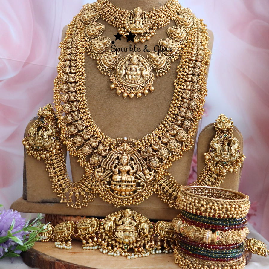 ✨ Grand Temple Bridal Set – A Timeless Treasure of Divine Elegance ✨
Wedding Season Sale Get 15% discount on sitewide
Get Free Gift Above 10k
Get Free Shipping above 7.5k &30k(Domestic&
International)
Get 7% discount on first order

1.ID L-1325,S-4408,C-19350,H-25253,E-14538,EC-27981
2.ID L-13147,S-8780,C-23414,H-7427,Eset-30421
3.ID L-1171,S-8724,C-7928,H-7427,Eset-30533
4.ID L-6737,S-13743,C-13722,H-3479,Eset-30540
5.ID L-6739,S-7418,C-26102,H-3479,Eset-30533

Visit website to place your order, link in th