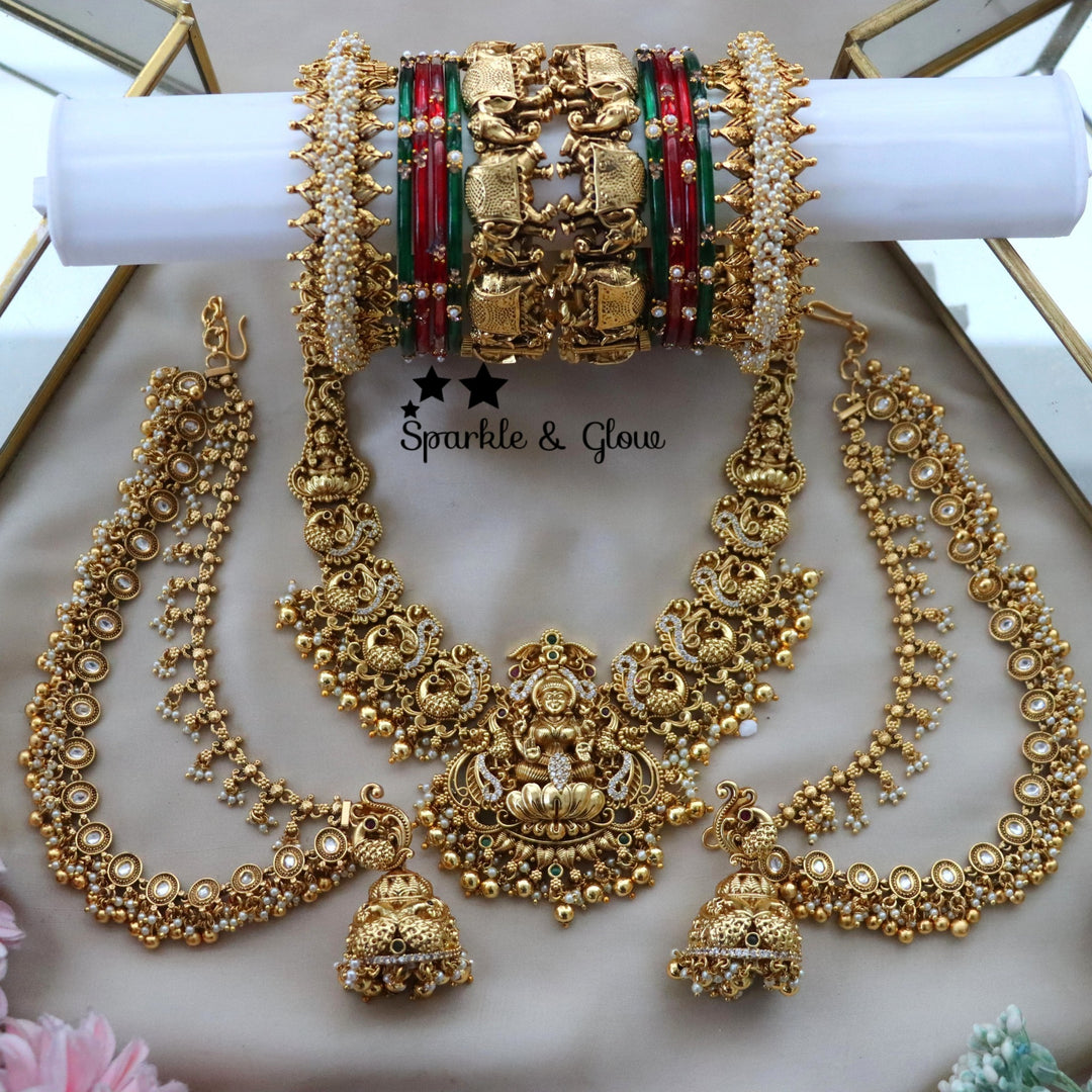 ✨Grand Temple Semi Bridal Set – Timeless Heritage Crafted for Every Celebration✨
Wedding Season Sale Get 15% discount on sitewide
Get Free Gift Above 10k
Get Free Shipping above 7.5k &30k(Domestic&
International)
Get 7% discount on first order

1.ID S-20453,EC-27931,B-2945,24605,18640_2_4
2.ID S-29585,EC-27930,B-17451,29589_2_6,18504_2_6
3.ID S-11631,EC-28329,B-2945,2975,18504_2_6
4.ID S-26525,EC-22034,B-24353,23506,18478_2_4
5.ID S-29068,EC-27930,B-2945,17414,18504_2_6
6.ID S-28955,EC-28326,B-2945,2975,185