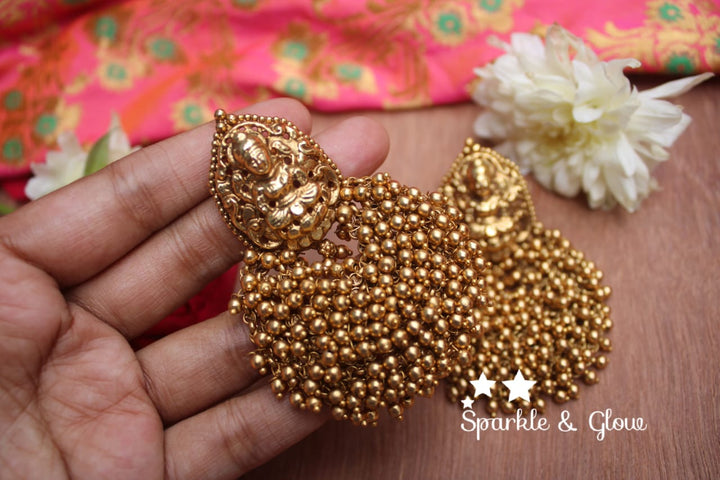 Gold alike Lakshmi festive bali with pearl cluster