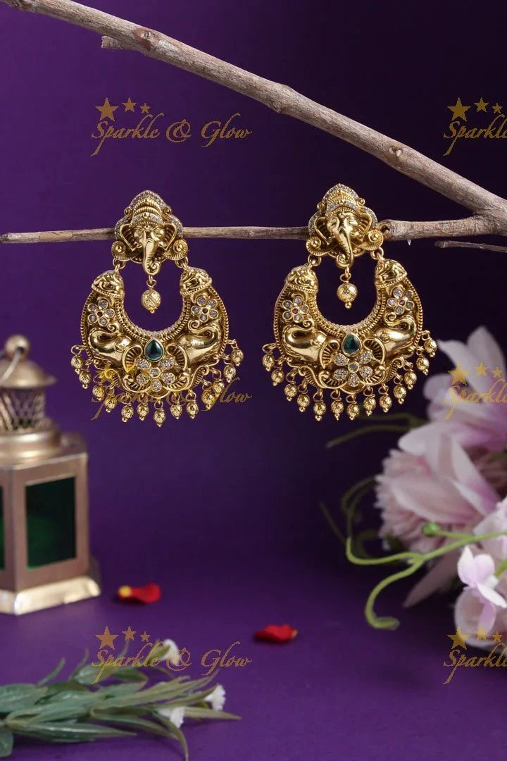 Gold alike Ganesh studded elephant carved chandbalis - Sparkle and Glow
