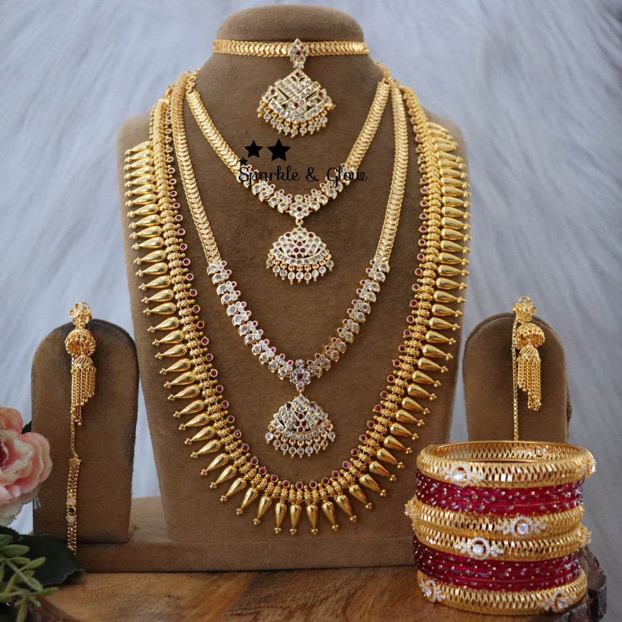 Celebrate the spirit of Onam with our exquisite micro gold plated bridal jewellery collection!❤
Wedding Season Sale Get 15% discount on sitewide
Get Free Gift Above 10k
Get Free Shipping above 7.5k &30k(Domestic&International)
Get 7% discount on First Order

1.ID L-24016,Set-26219,S-30350,E-30829,EC-24097
2.ID L-19856,Set-30894,S-13782,E-24107,EC-24096
3.ID L-14110,ML-24006,S-19799,C-23997,E-24108,EC-24092
4.ID L-17657,Set-30879,E-30829,EC-24097
5.ID L-17657,Set-30919,C-24802,E-24108,EC-24092

Visit website