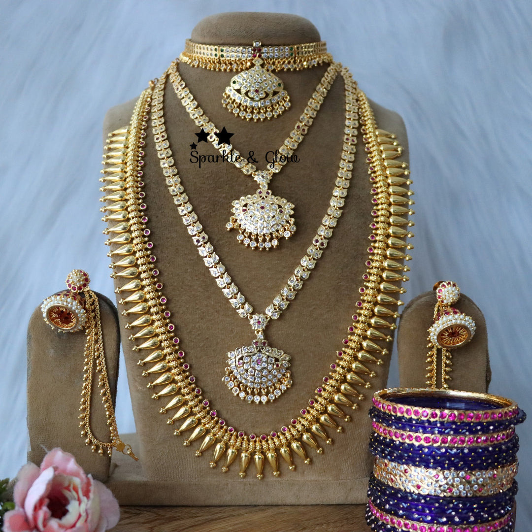 Celebrate the spirit of Onam with our exquisite micro gold plated bridal jewellery collection!❤
Wedding Season Sale Get 15% discount on sitewide
Get Free Gift Above 10k
Get Free Shipping above 7.5k &30k(Domestic&International)
Get 7% discount on First Order

1.ID L-24016,Set-26219,S-30350,E-30829,EC-24097
2.ID L-19856,Set-30894,S-13782,E-24107,EC-24096
3.ID L-14110,ML-24006,S-19799,C-23997,E-24108,EC-24092
4.ID L-17657,Set-30879,E-30829,EC-24097
5.ID L-17657,Set-30919,C-24802,E-24108,EC-24092

Visit website