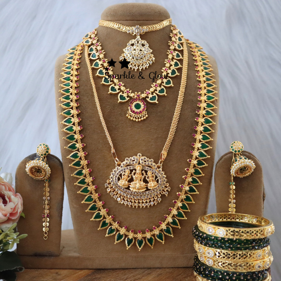 Celebrate the spirit of Onam with our exquisite micro gold plated bridal jewellery collection!❤
Wedding Season Sale Get 15% discount on sitewide
Get Free Gift Above 10k
Get Free Shipping above 7.5k &30k(Domestic&International)
Get 7% discount on First Order

1.ID L-24016,Set-26219,S-30350,E-30829,EC-24097
2.ID L-19856,Set-30894,S-13782,E-24107,EC-24096
3.ID L-14110,ML-24006,S-19799,C-23997,E-24108,EC-24092
4.ID L-17657,Set-30879,E-30829,EC-24097
5.ID L-17657,Set-30919,C-24802,E-24108,EC-24092

Visit website
