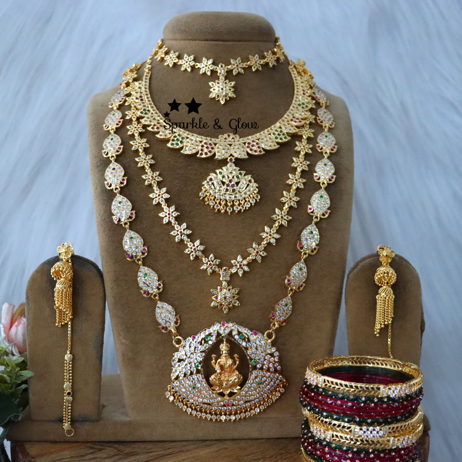 Celebrate the spirit of Onam with our exquisite micro gold plated bridal jewellery collection!❤
Wedding Season Sale Get 15% discount on sitewide
Get Free Gift Above 10k
Get Free Shipping above 7.5k &30k(Domestic&International)
Get 7% discount on First Order

1.ID L-24016,Set-26219,S-30350,E-30829,EC-24097
2.ID L-19856,Set-30894,S-13782,E-24107,EC-24096
3.ID L-14110,ML-24006,S-19799,C-23997,E-24108,EC-24092
4.ID L-17657,Set-30879,E-30829,EC-24097
5.ID L-17657,Set-30919,C-24802,E-24108,EC-24092

Visit website