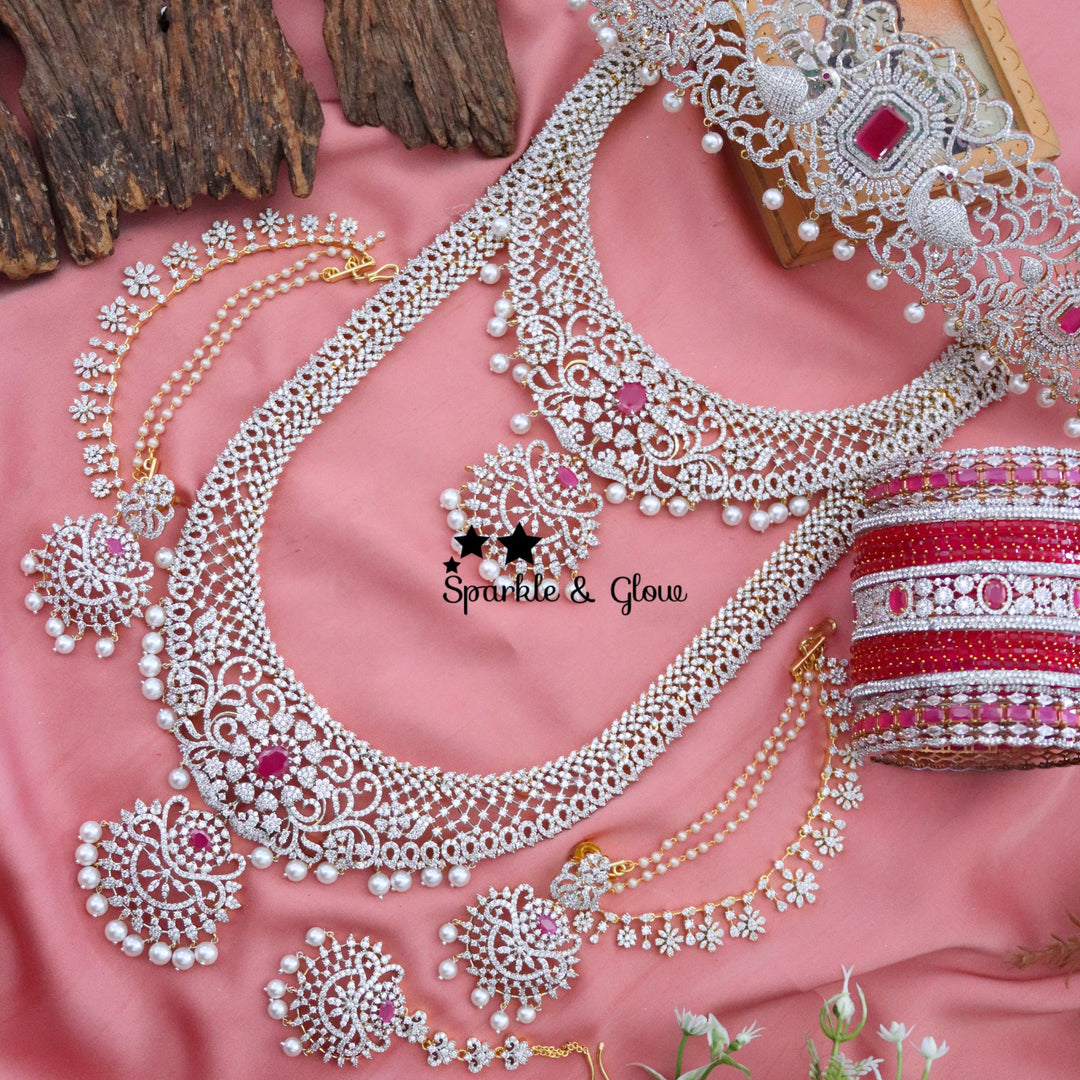 "Why spend lakhs when you can sparkle like a queen? 💎✨ This American Diamond Bridal Set is pure bridal luxury without the hefty price tag! 👰✨"
Wedding Season Sale Get 15% discount on sitewide
Get Free Gift Above 10k
Get Free Shipping above 7.5k &30k(Domestic&
International)
Get 7% discount on First Order
1 ID L-12407,C-19425,EC-30801,H-16085,M-23908
2.ID L-29831,C-2010,EC-20150,H-12928,M-23895
3. ID L-7902,C-19356,EC-30802,H-12936,M-23879
4. ID Set-12405,EC-27010,H-13380,M-9908
5.ID L-10089,C-26931,EC-  1